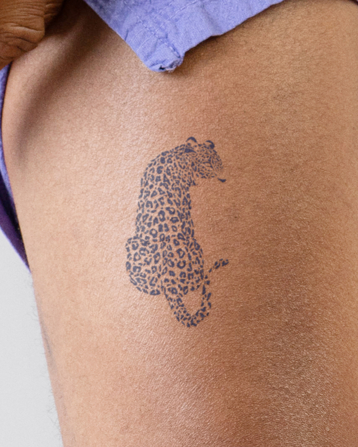 Leopard & Flowers | Tattoo Ideas For Men & Women in 2024