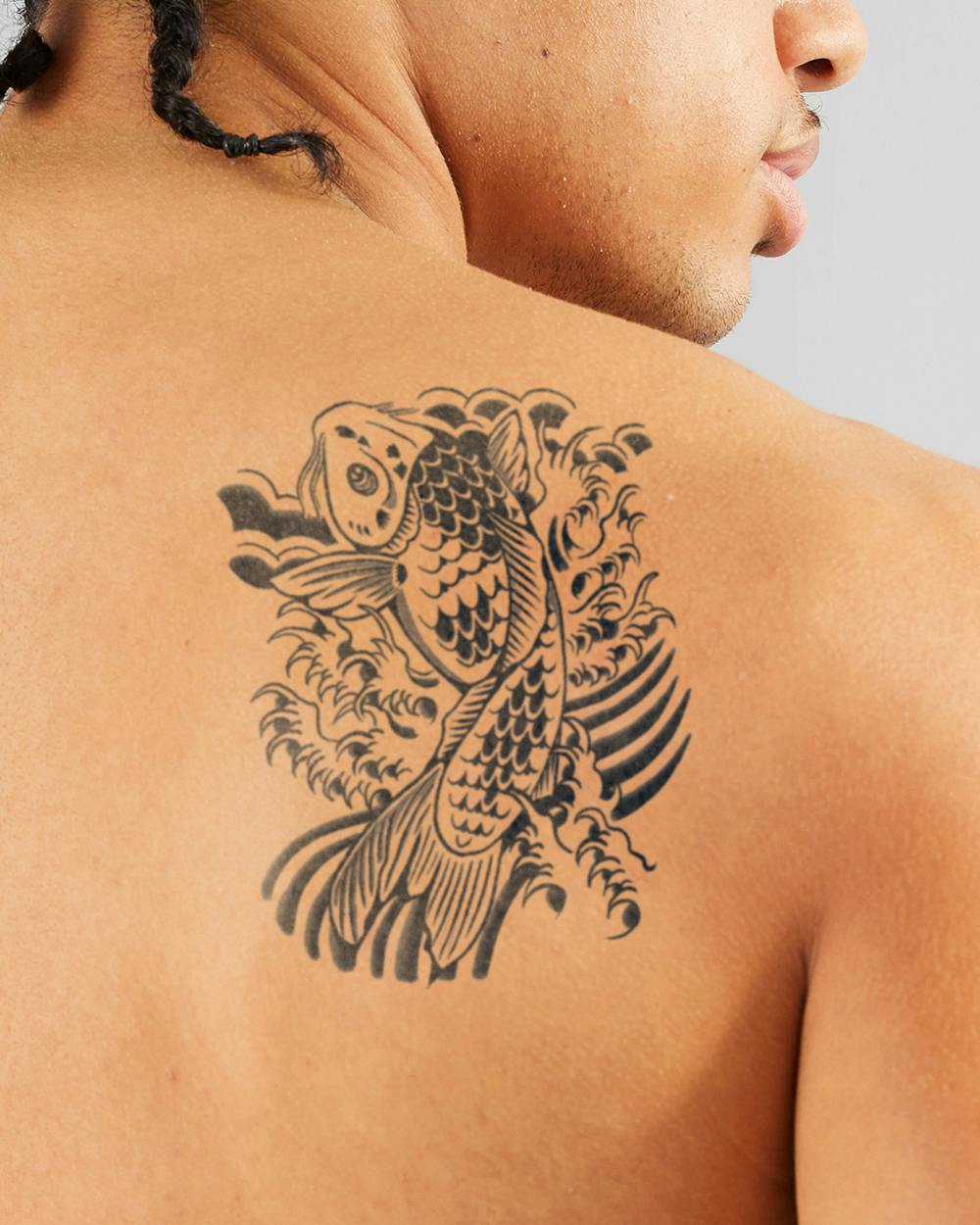 Fish tattoos can represent freedom, as fish are known for their